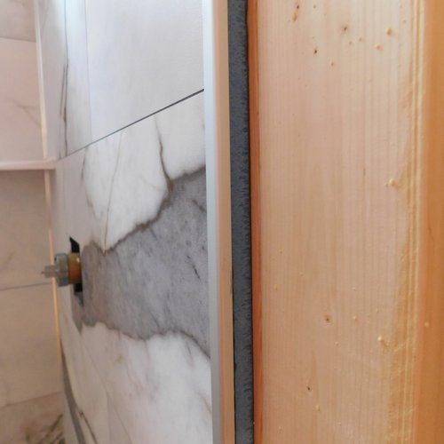 LVT Wall End Showing the layers and trim
